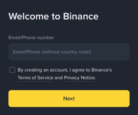 binance registration screen prompting the user to enter an email or phone number and agree to the terms of service