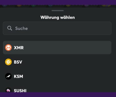 Das Bild zeigt, wie man XMR als Währung im Casino auswählt